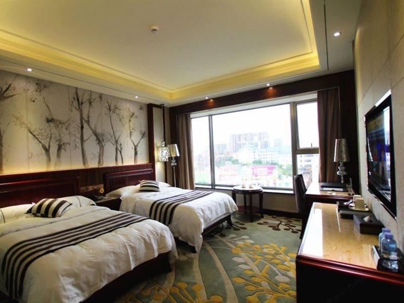 Jin Long Wan Hao Hotel Wuzhou Exteriör bild