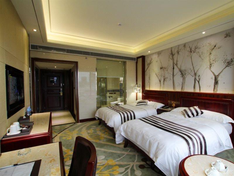 Jin Long Wan Hao Hotel Wuzhou Exteriör bild