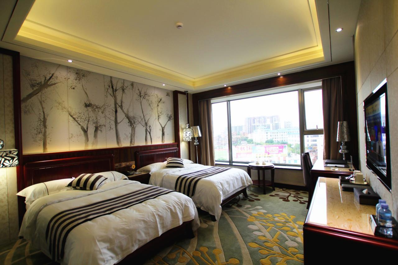 Jin Long Wan Hao Hotel Wuzhou Exteriör bild